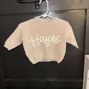 Beige Knit Sweater with White Script